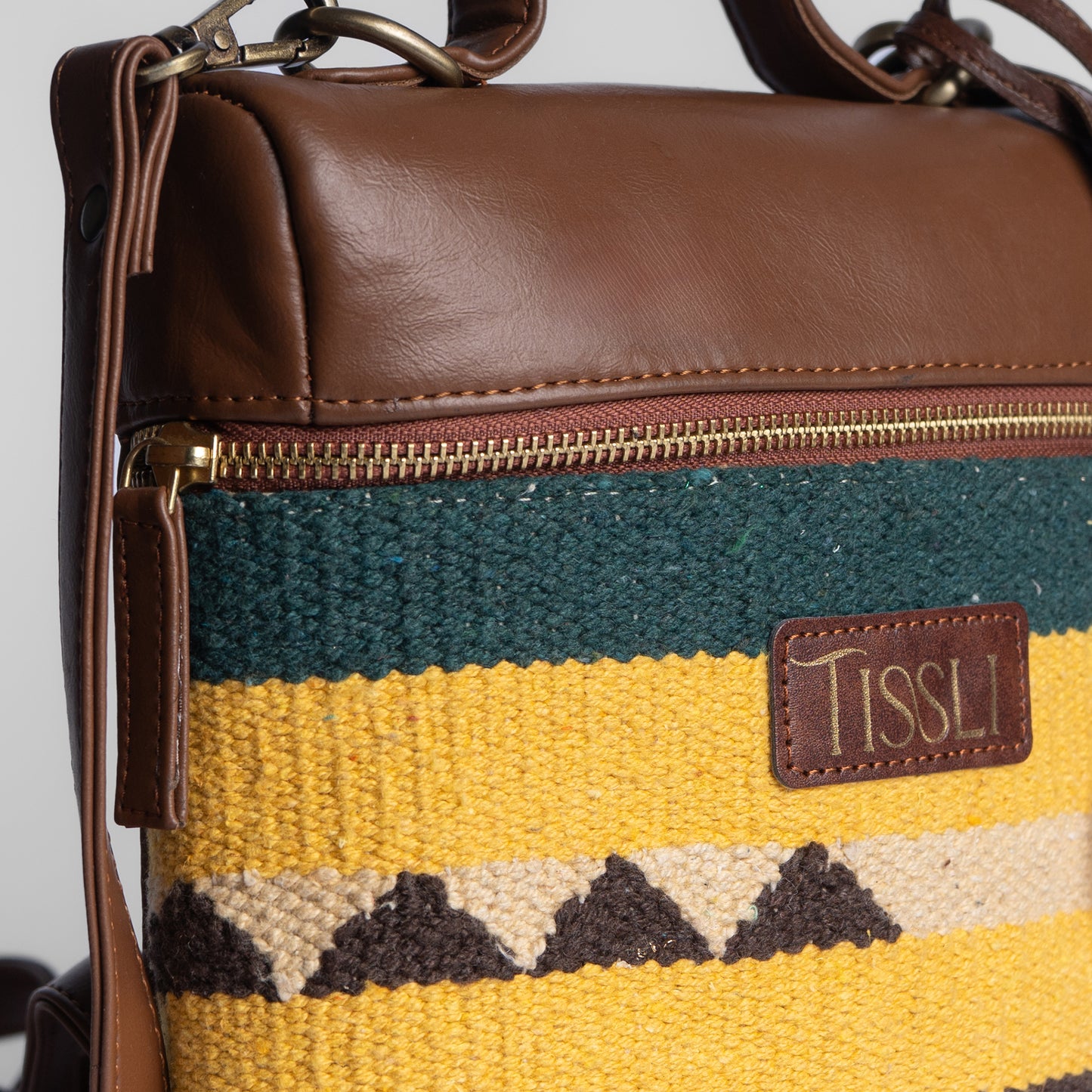 Canyon Stripes Backpack | A handcrafted blend of mustard, brown, and green for everyday adventures