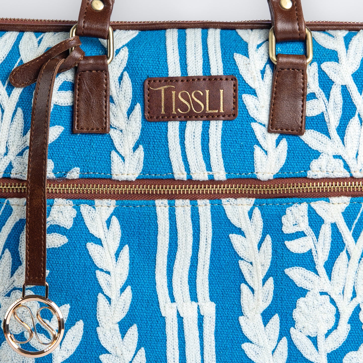 Chikankari Laptop Bag | Blue handwoven design with vertical floral embroidery for everyday elegance