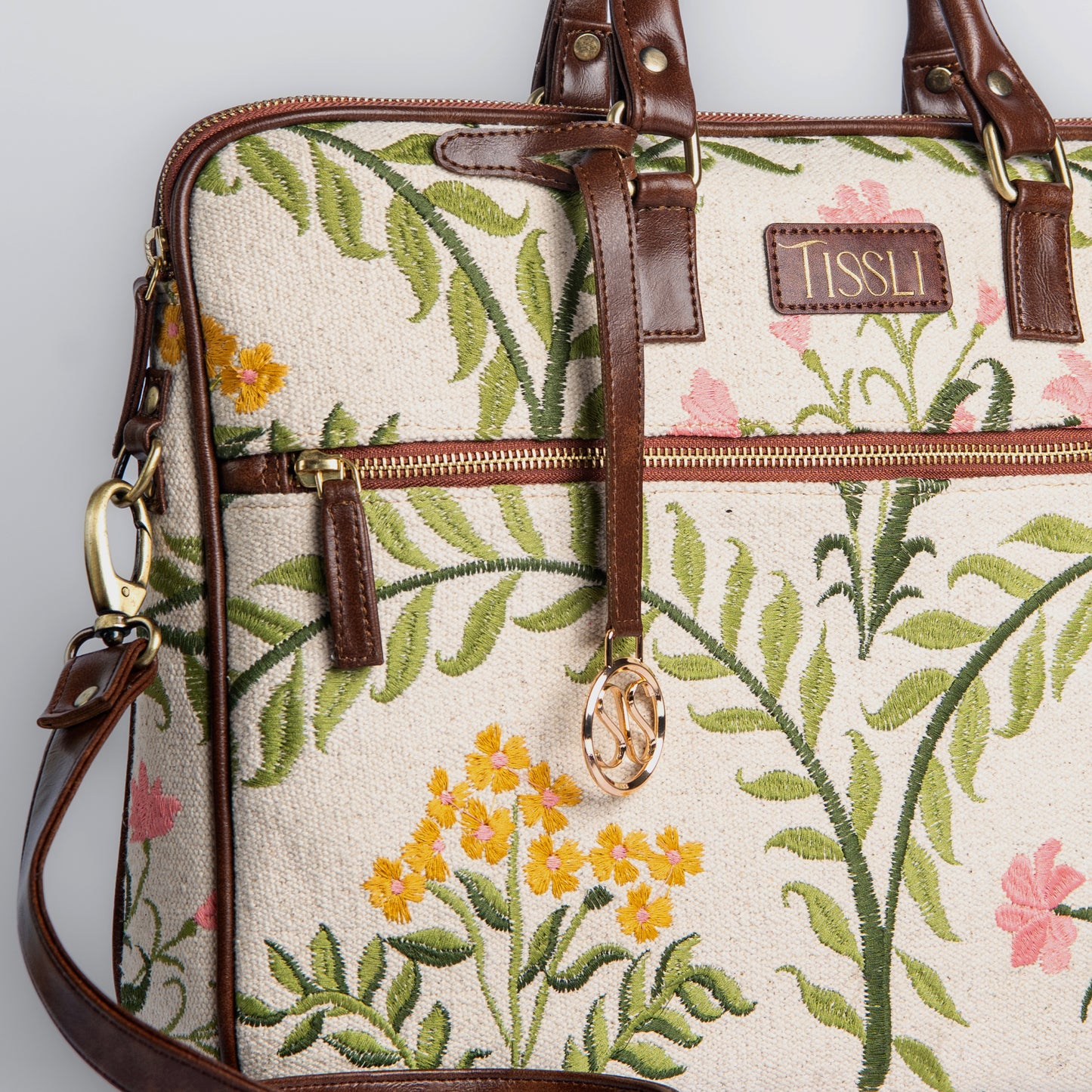 Gulzar Laptop Bag | Handcrafted floral design that brings nature’s calm to your everyday look