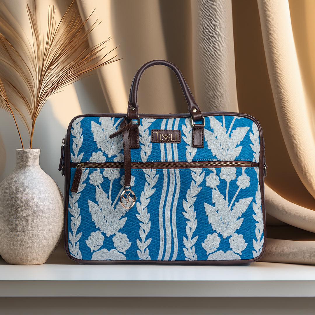 Chikankari Bloom Laptop Bag | White floral embroidery on blue base, handcrafted for timeless charm