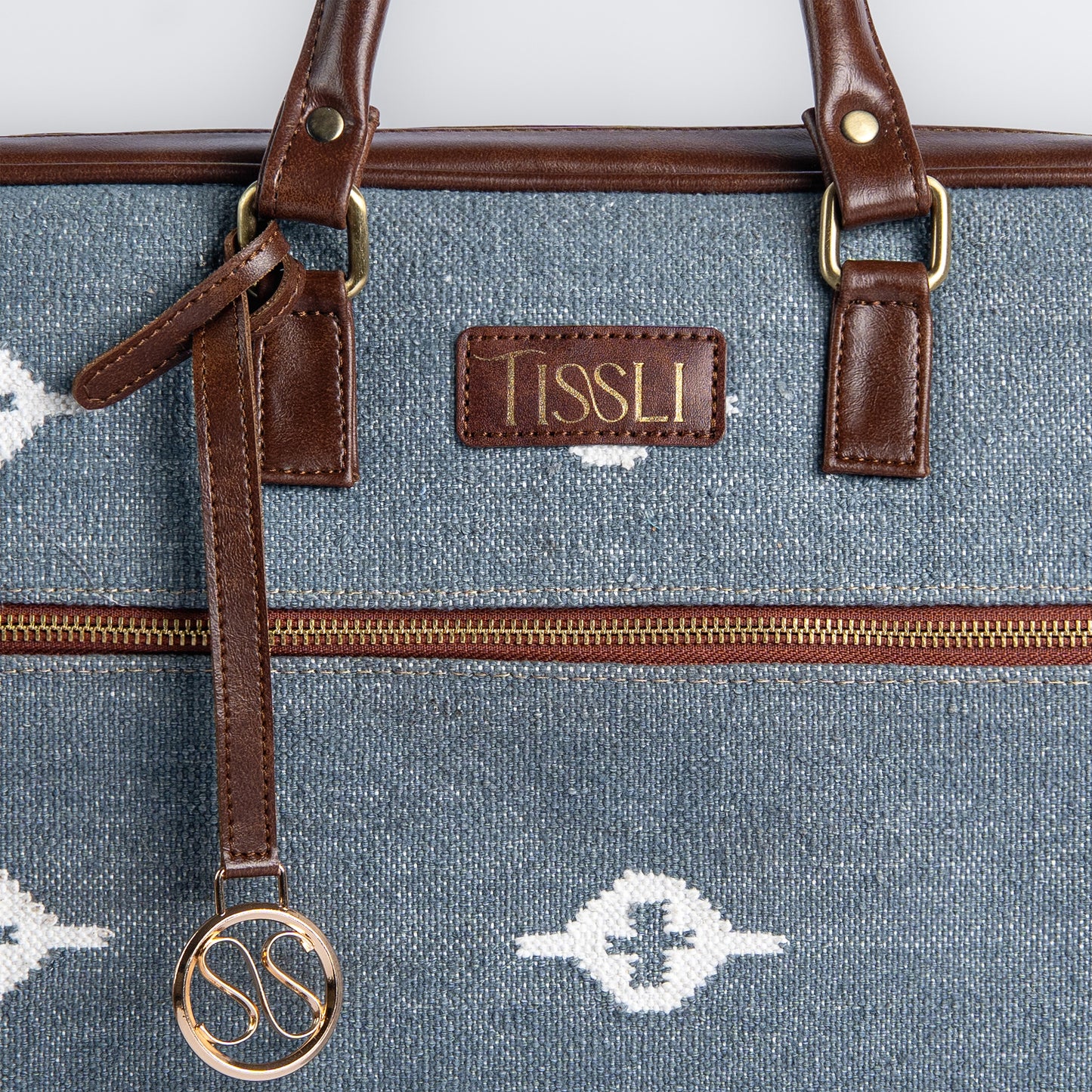 Skylight Serenity Laptop Bag | Handwoven blue design that brings calm and class to your workdays
