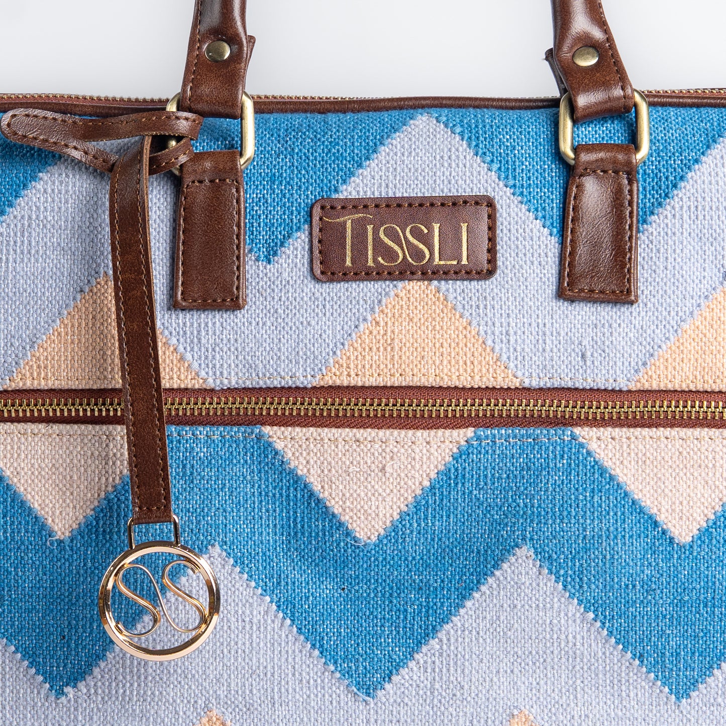 Dream Weaver Laptop Bag | Soft pastel handwoven bag made for light, everyday elegance