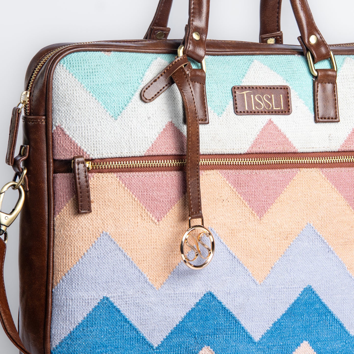 Dream Weaver Laptop Bag | Soft pastel handwoven bag made for light, everyday elegance