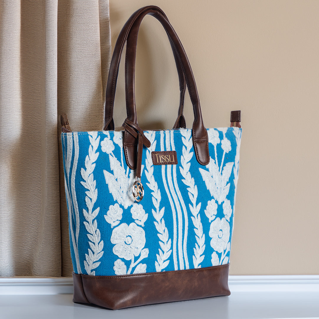 Chikankari Bloom Tote Bag | Handwoven blue and white floral design inspired by traditional Indian embroidery