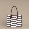 Shadow Maze Black & White Geometric Tote Bag with Brown Leather Base | Handcrafted Everyday Shoulder Bag