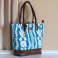 Chikankari Bloom Tote Bag | Handwoven blue and white floral design inspired by traditional Indian embroidery
