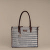 Handwoven Stripe Tote Bag | Classic neutral weave with leather detailing for timeless everyday elegance