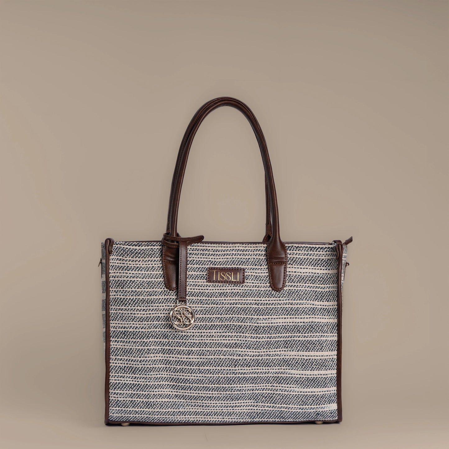 Handwoven Stripe Tote Bag | Classic neutral weave with leather detailing for timeless everyday elegance