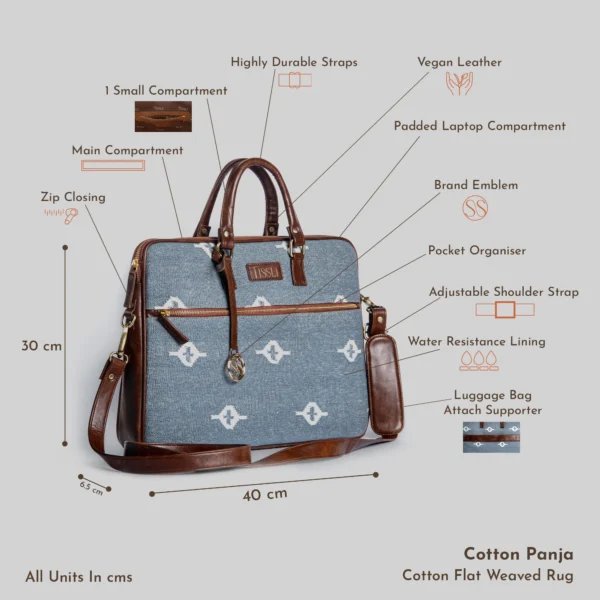 Slate grey handwoven rug laptop bag featuring white eye-shaped geometric patterns and brown vegan leather detailing.